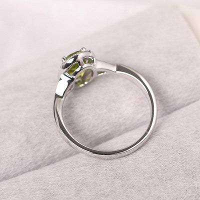 Oval Shaped Peridot Halo Engagement Ring - Palmary