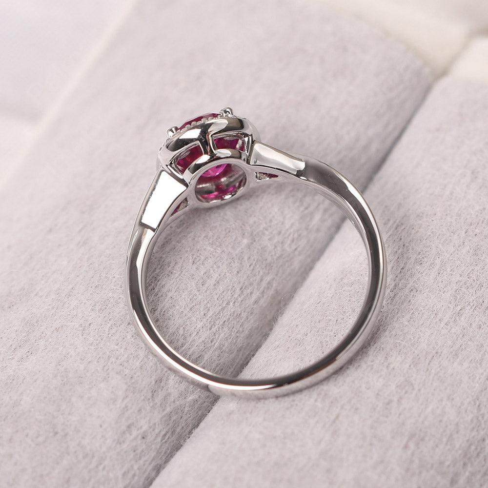 Oval Shaped Ruby Halo Engagement Ring - Palmary