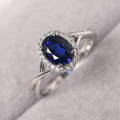 Oval Shaped Sapphire Halo Engagement Ring - Palmary