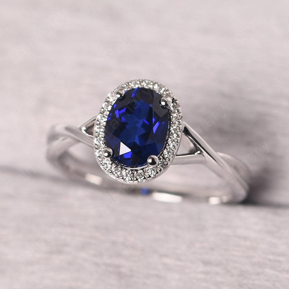 Oval Shaped Sapphire Halo Engagement Ring - Palmary