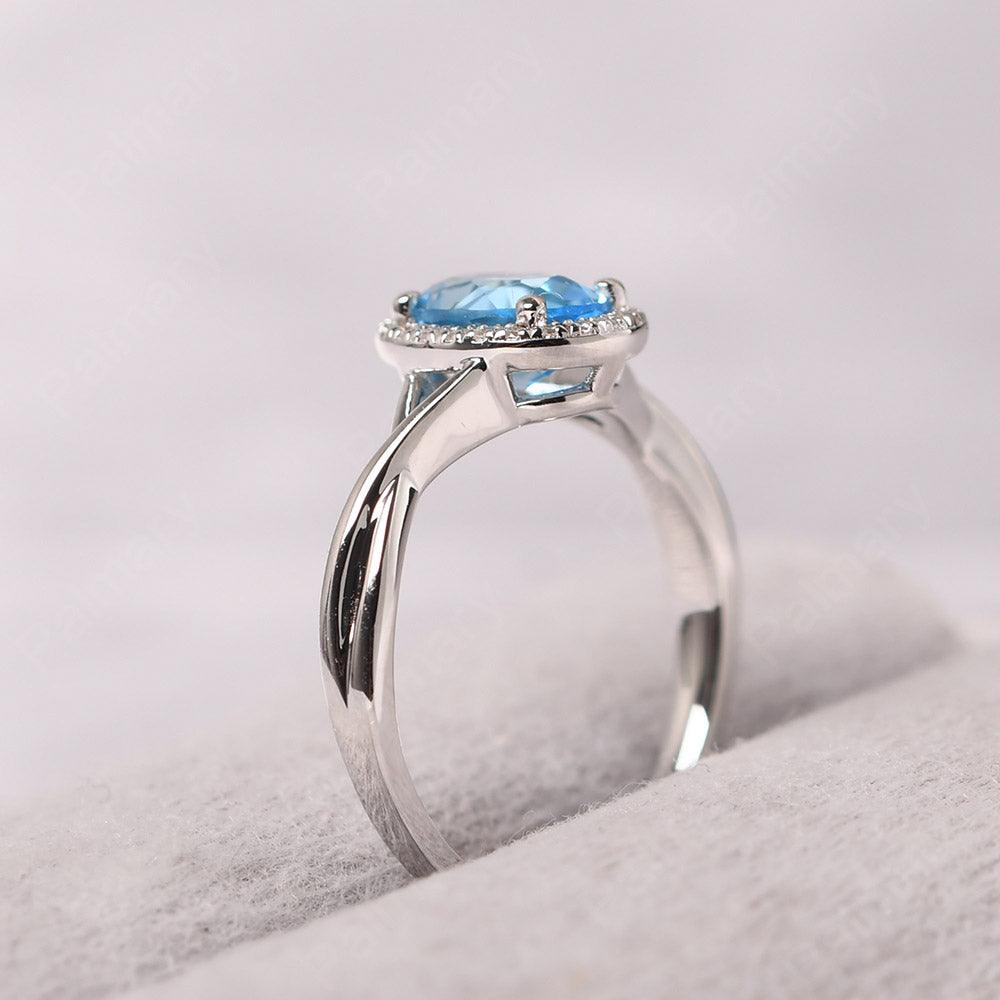 Oval Shaped Swiss Blue Topaz Halo Engagement Ring - Palmary
