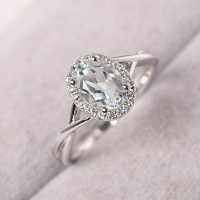 Oval Shaped White Topaz Halo Engagement Ring - Palmary
