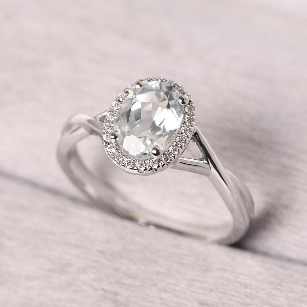 Oval Shaped White Topaz Halo Engagement Ring - Palmary