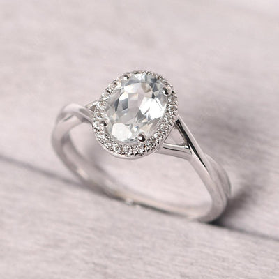 Oval Shaped White Topaz Halo Engagement Ring - Palmary