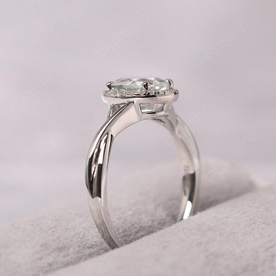 Oval Shaped White Topaz Halo Engagement Ring - Palmary
