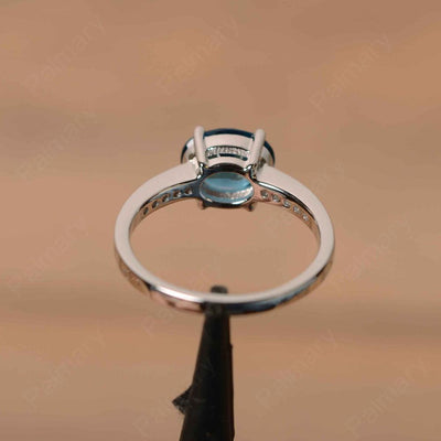 East West Oval Cut London Blue Topaz Engagement Rings - Palmary