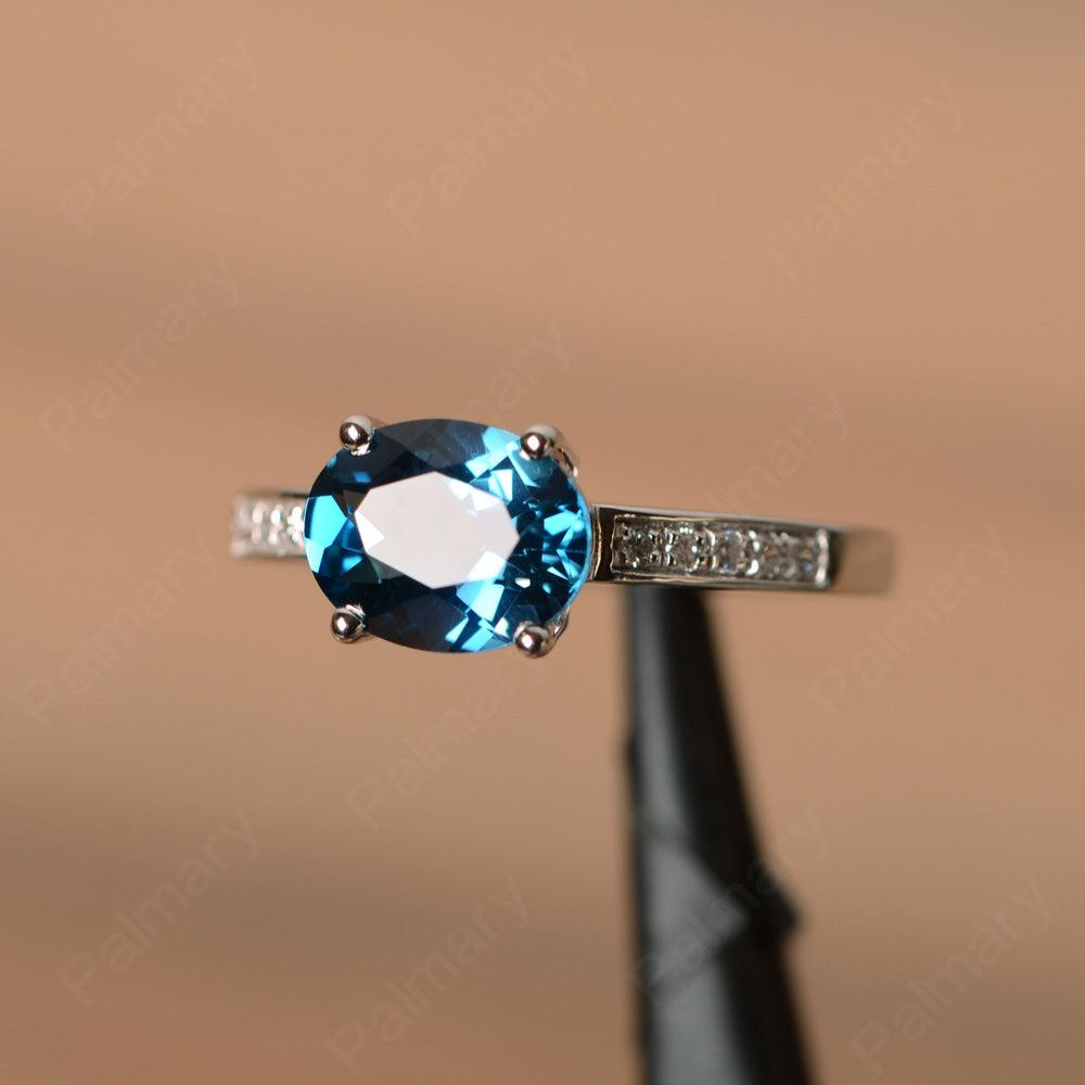 East West Oval Cut London Blue Topaz Engagement Rings - Palmary
