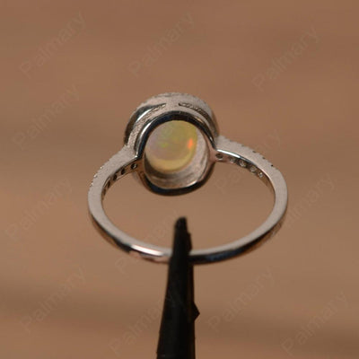 Oval Cabochon Opal Wedding Rings - Palmary