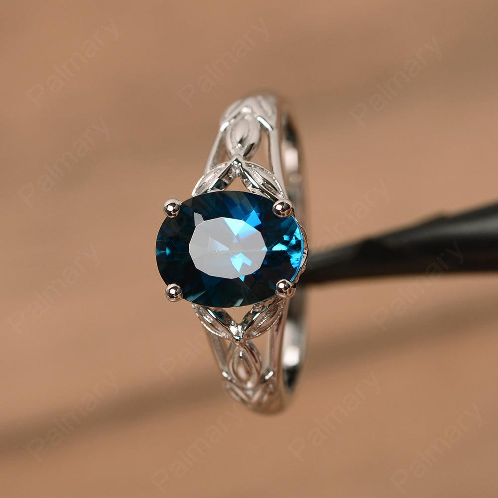 Oval London Blue Topaz Solitaire Rings - Palmary