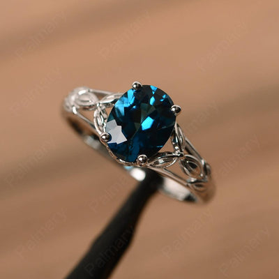 Oval London Blue Topaz Solitaire Rings - Palmary