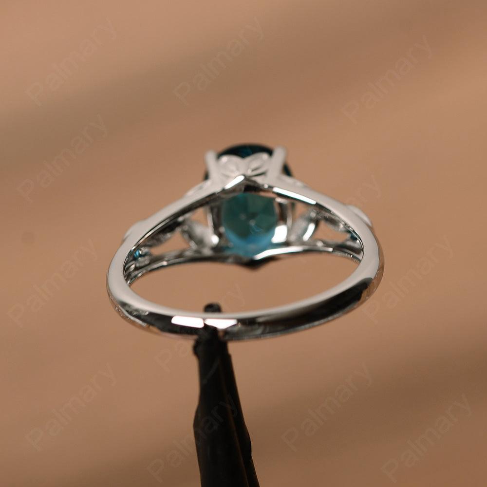 Oval London Blue Topaz Solitaire Rings - Palmary