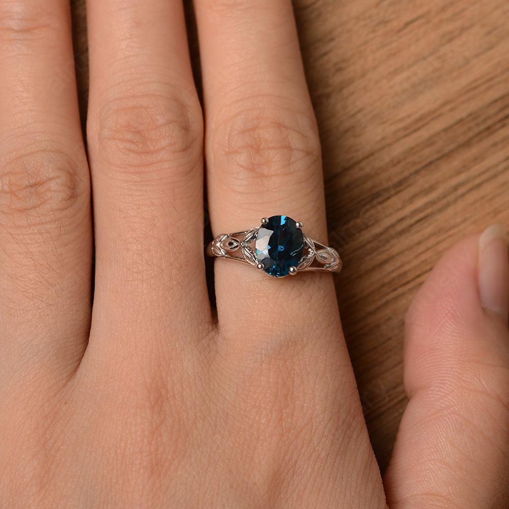 Oval London Blue Topaz Solitaire Rings - Palmary
