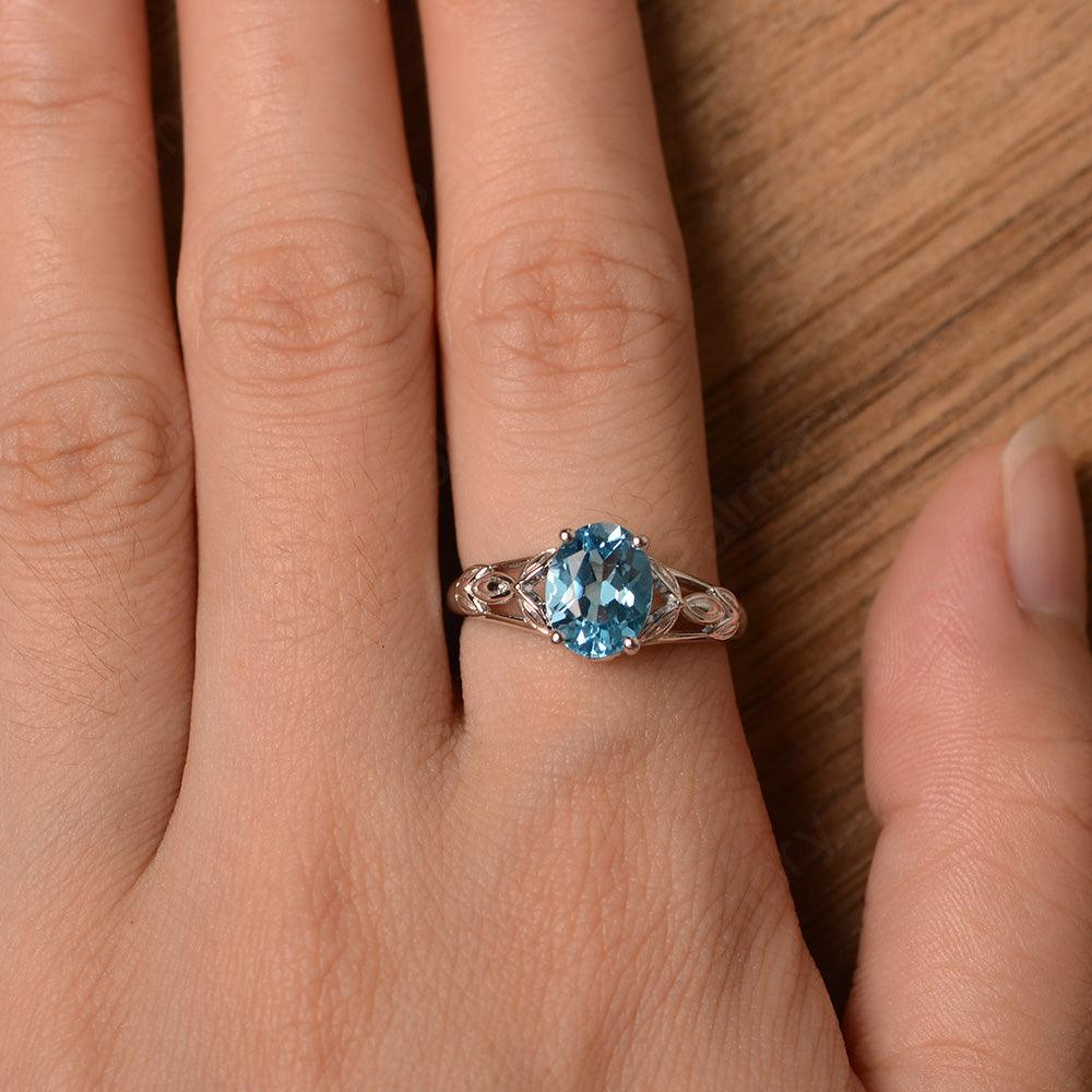 Oval Swiss Blue Topaz Solitaire Rings - Palmary