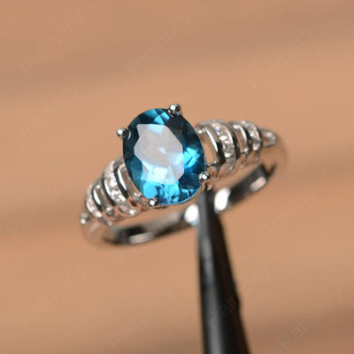Oval Shaped London Blue Topaz Engagement Rings - Palmary