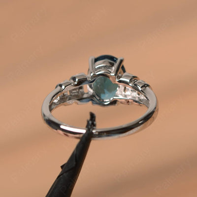 Oval Shaped London Blue Topaz Engagement Rings - Palmary