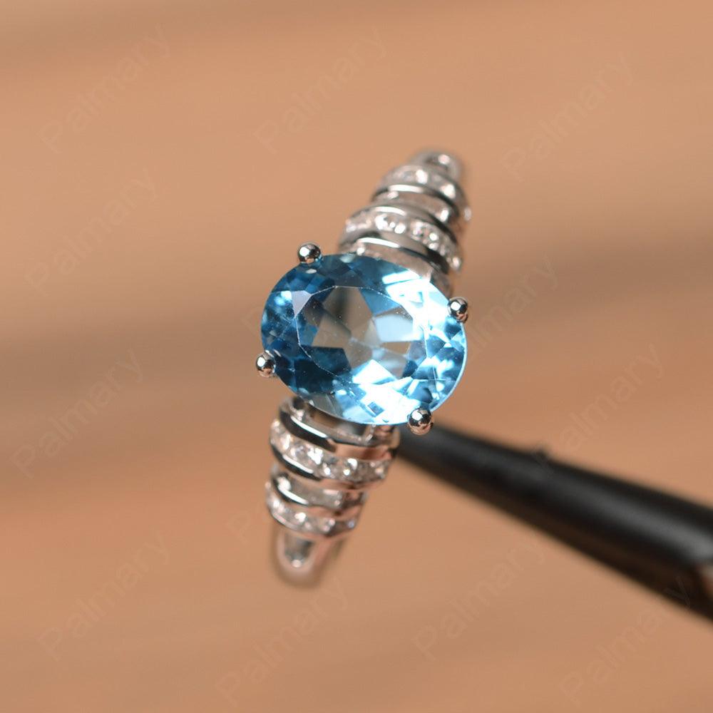 Oval Shaped Swiss Blue Topaz Engagement Rings - Palmary