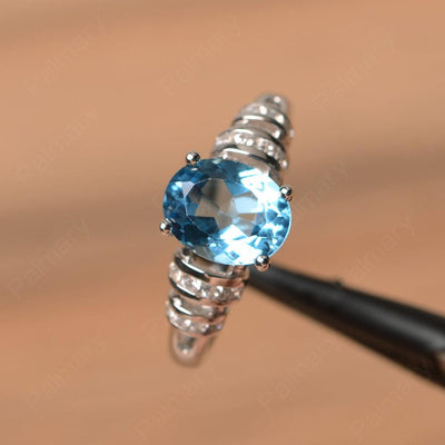 Oval Shaped Swiss Blue Topaz Engagement Rings - Palmary