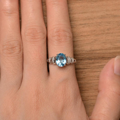 Oval Shaped Swiss Blue Topaz Engagement Rings - Palmary