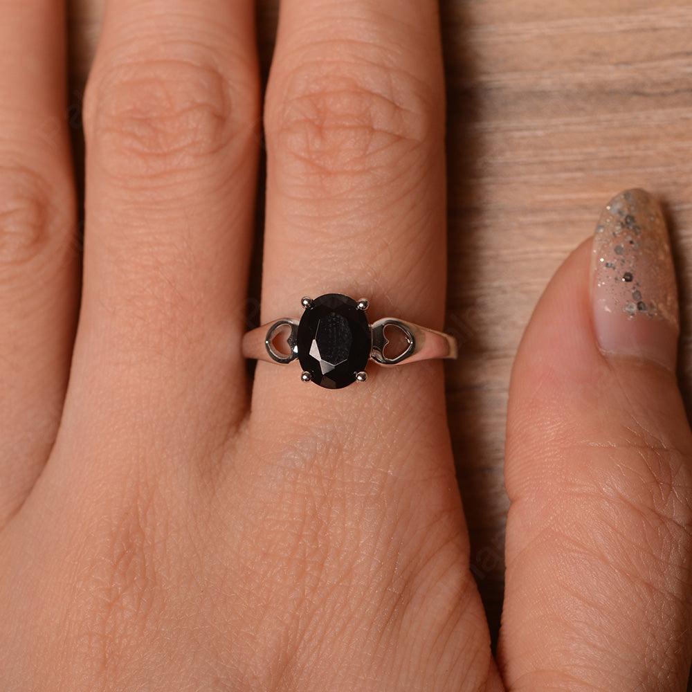 Oval Black Spinel Ring With Heart On Band - Palmary