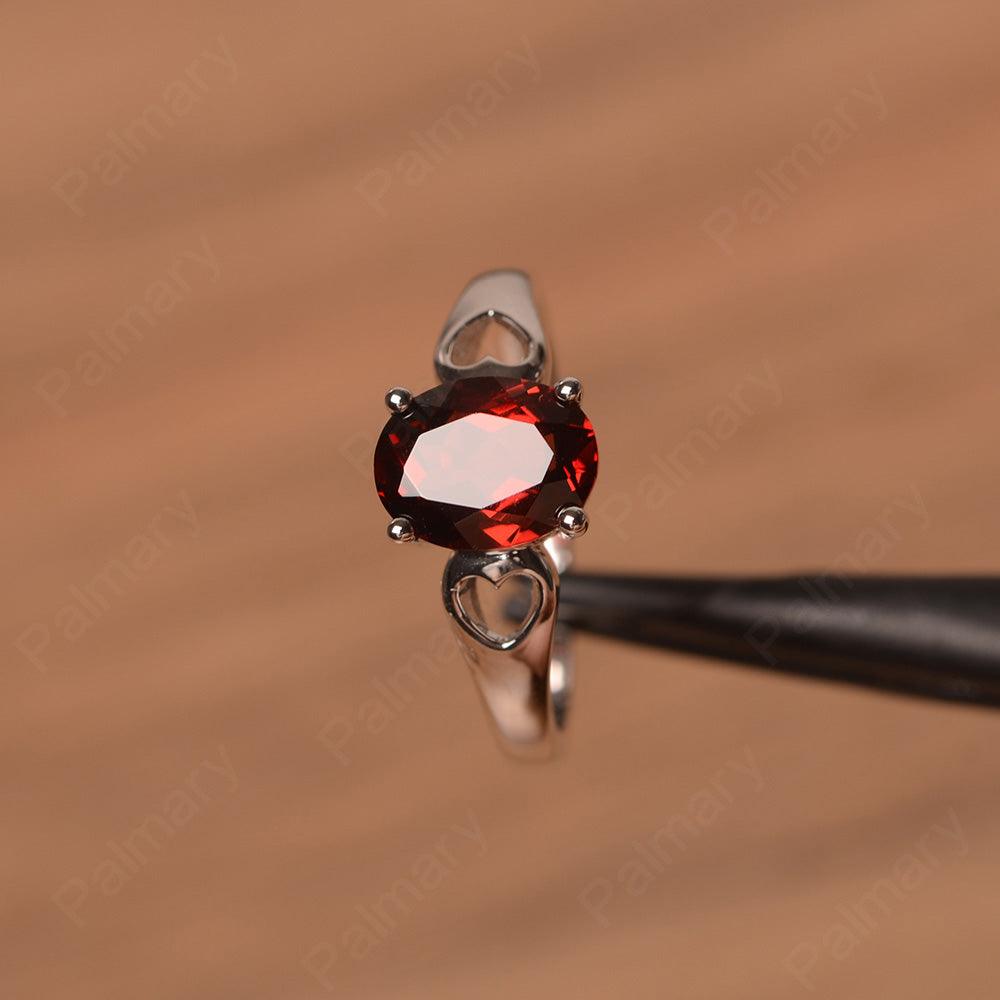 Oval Garnet Ring With Heart On Band - Palmary