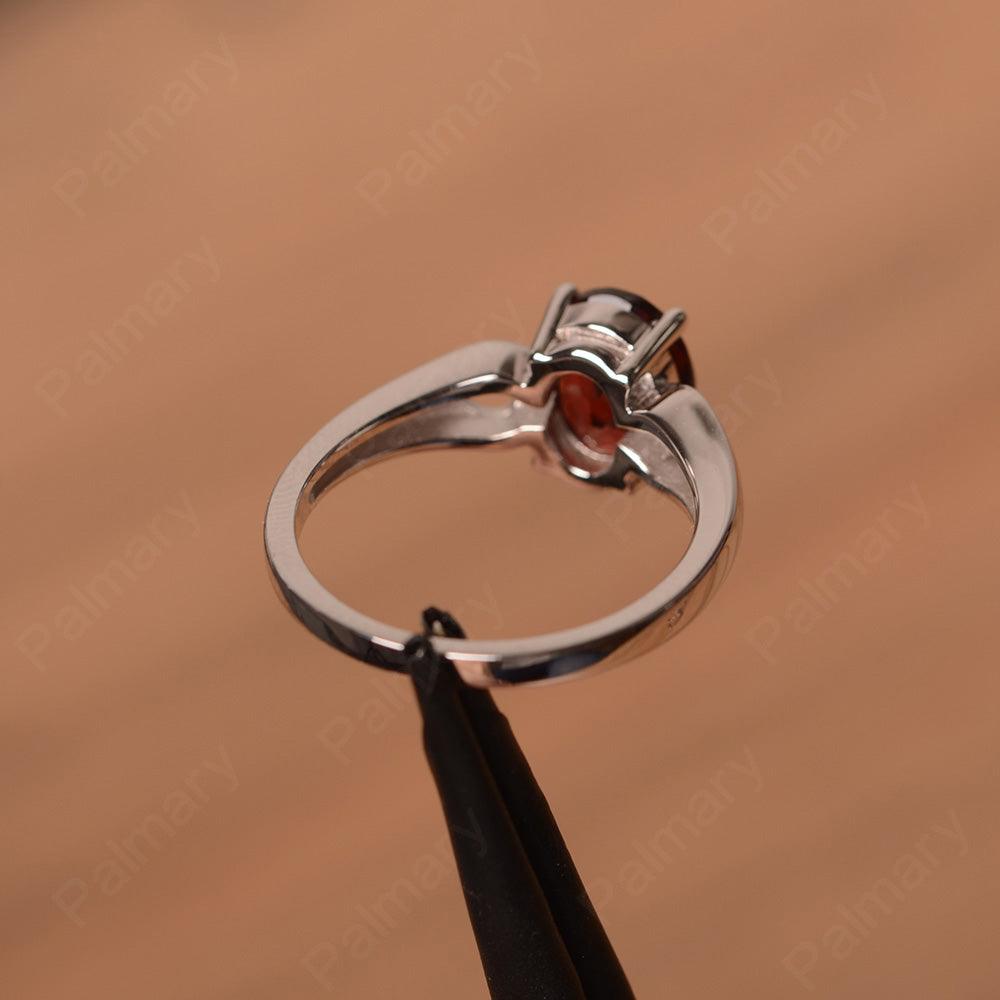 Oval Garnet Ring With Heart On Band - Palmary