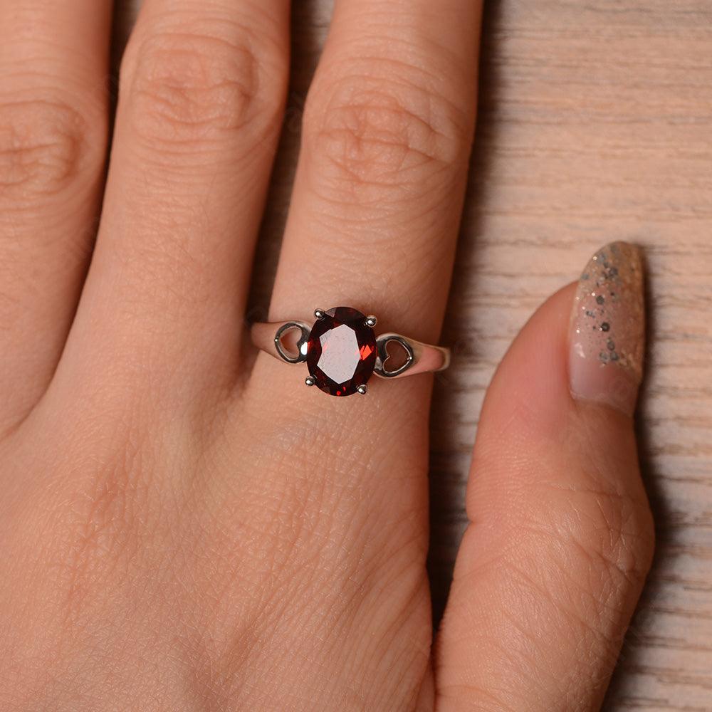 Oval Garnet Ring With Heart On Band - Palmary