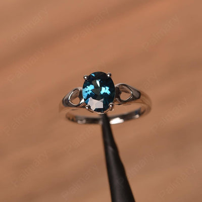 Oval London Blue Topaz Ring With Heart On Band - Palmary