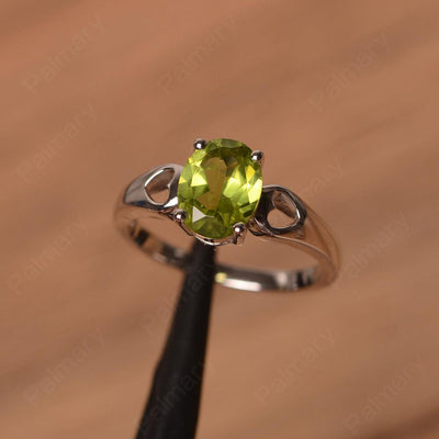 Oval Peridot Ring With Heart On Band - Palmary