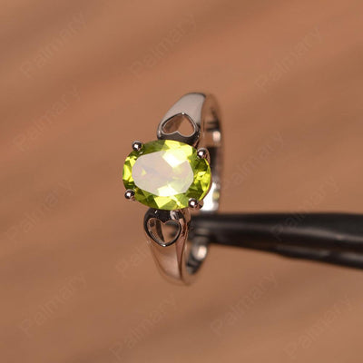 Oval Peridot Ring With Heart On Band - Palmary