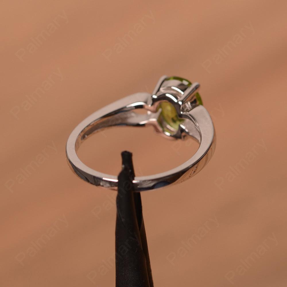 Oval Peridot Ring With Heart On Band - Palmary