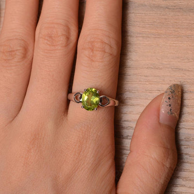 Oval Peridot Ring With Heart On Band - Palmary