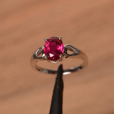 Oval Ruby Ring With Heart On Band - Palmary