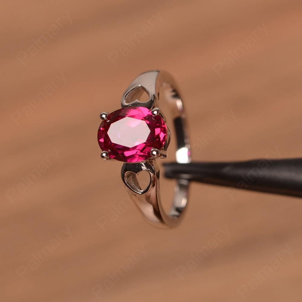 Oval Ruby Ring With Heart On Band - Palmary
