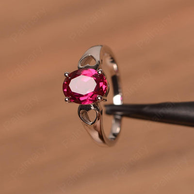 Oval Ruby Ring With Heart On Band - Palmary