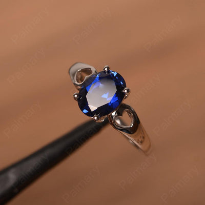 Oval Sapphire Ring With Heart On Band - Palmary