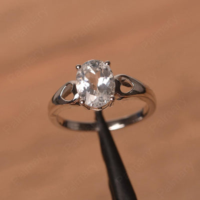 Oval White Topaz Ring With Heart On Band - Palmary