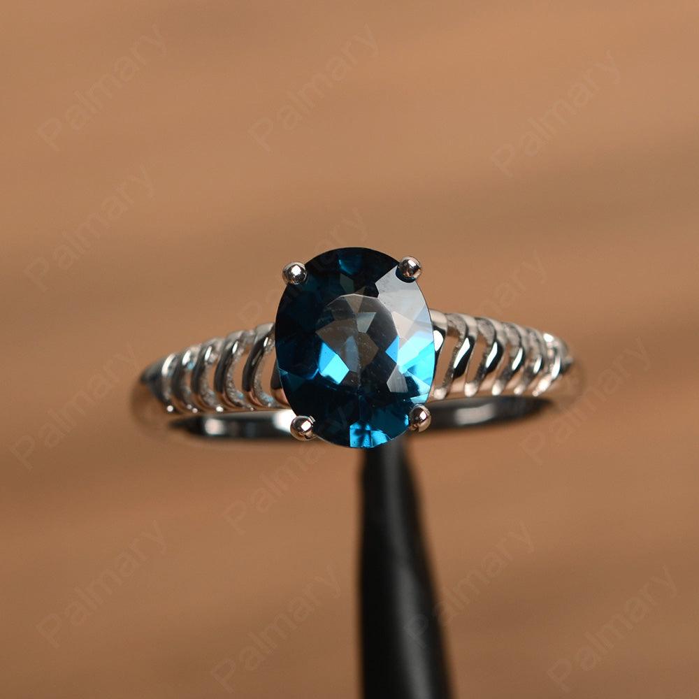 Fence Oval London Blue Topaz Solitaire Rings - Palmary