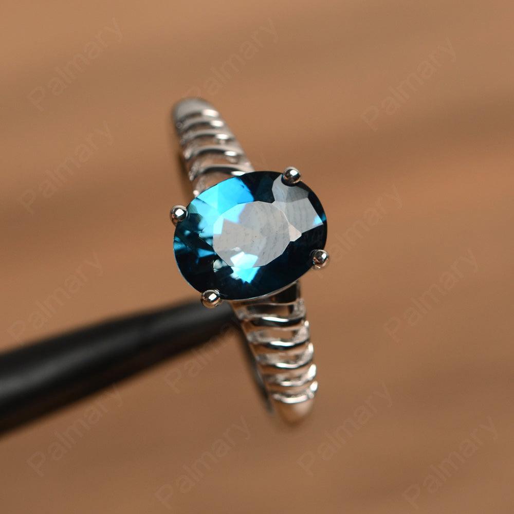 Fence Oval London Blue Topaz Solitaire Rings - Palmary