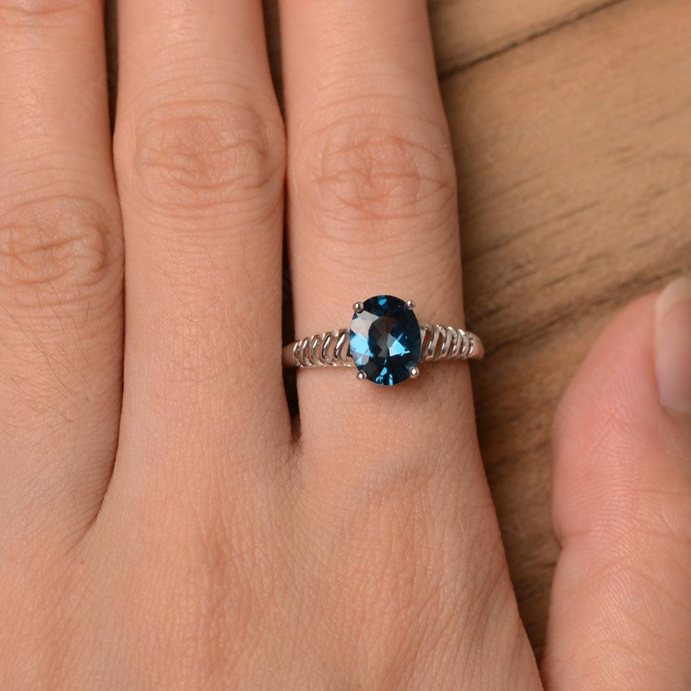 Fence Oval London Blue Topaz Solitaire Rings - Palmary