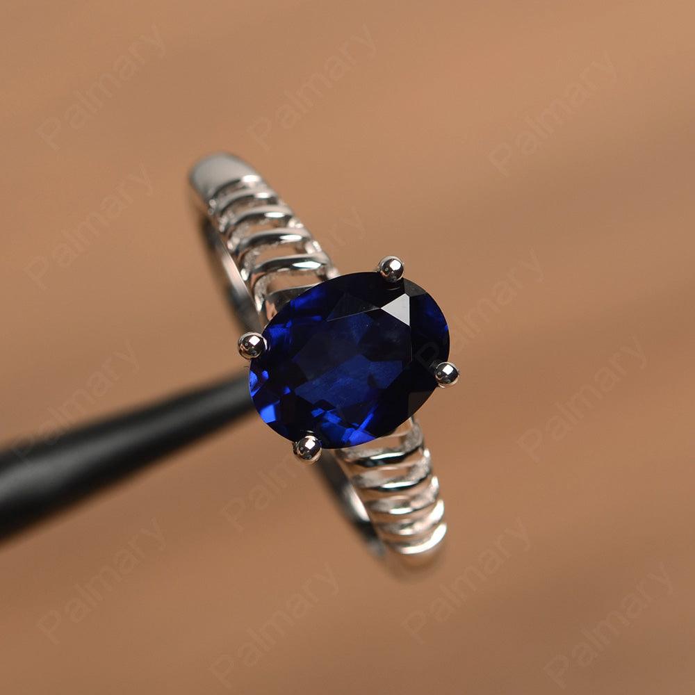 Fence Oval Sapphire Solitaire Rings - Palmary