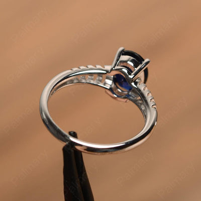 Fence Oval Sapphire Solitaire Rings - Palmary