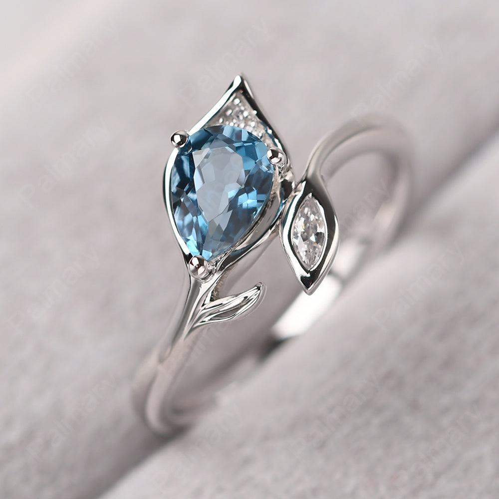Pear Shaped London Blue Topaz Wedding Rings - Palmary