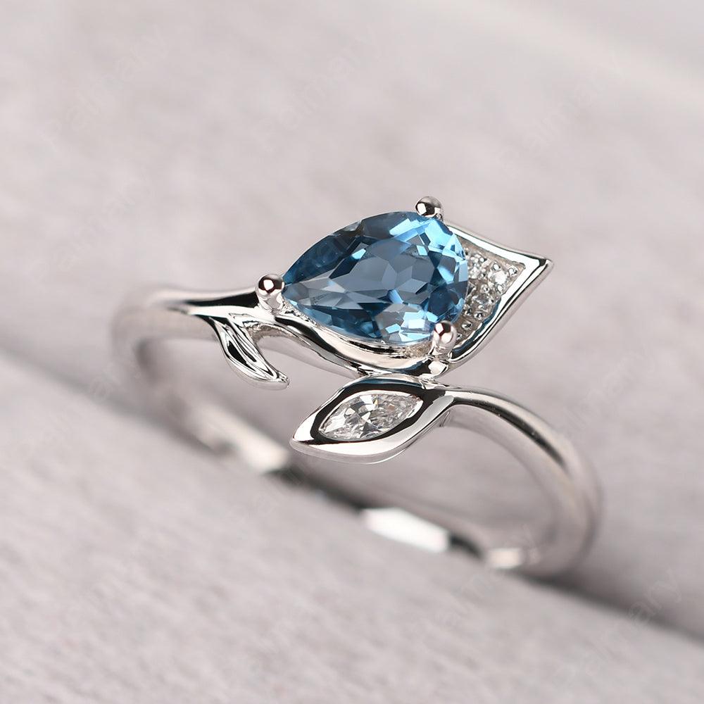 Pear Shaped London Blue Topaz Wedding Rings - Palmary