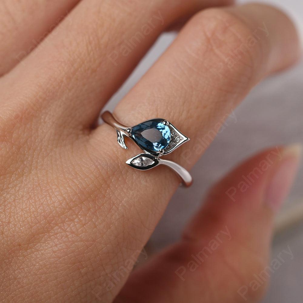 Pear Shaped London Blue Topaz Wedding Rings - Palmary