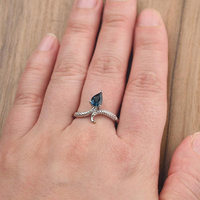 Snake London Blue Topaz Solitaire Ring - Palmary