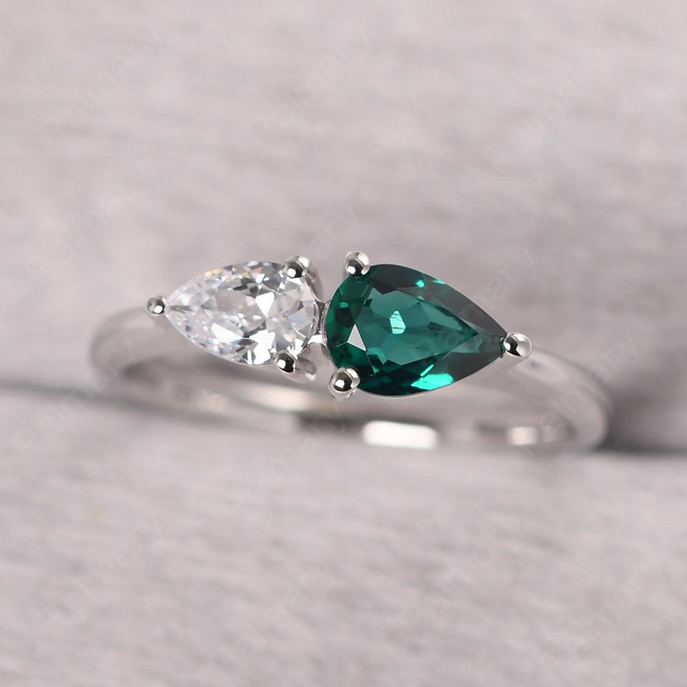 East West Pear Shaped Cubic Zirconia And Emerald Two Stone Ring - Palmary