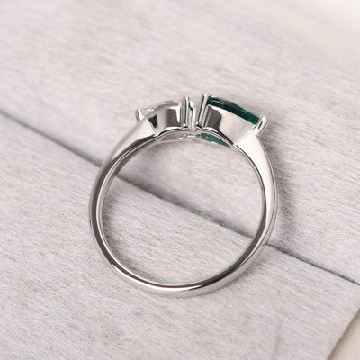 East West Pear Shaped Cubic Zirconia And Emerald Two Stone Ring - Palmary