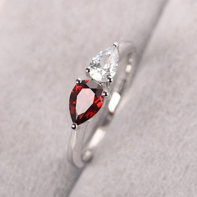 East West Pear Shaped Cubic Zirconia And Garnet Two Stone Ring - Palmary