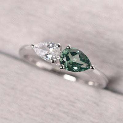 East West Pear Shaped Cubic Zirconia And Green Sapphire Two Stone Ring - Palmary