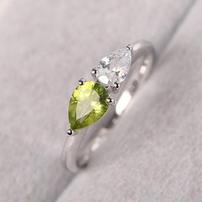 East West Pear Shaped Cubic Zirconia And Peridot Two Stone Ring - Palmary